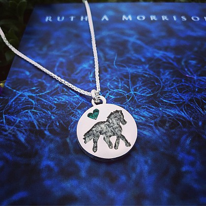Sterling silver and Harris Tweed. Approx 20mm pendant on an 18inch chain