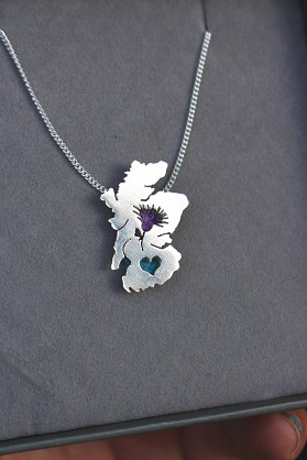 Sterling Silver and Harris Tweed - Approx 30x17mm with an 18inch chain 