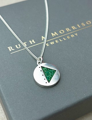 Sterling Silver and Harris Tweed -Approx 16mm with an 18inch chain 