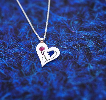 Sterling Silver with Harris Tweed - approx 18mm pendant with an 18inch chain 

