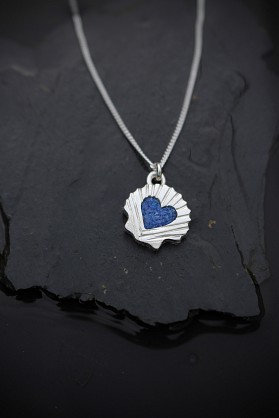 Sterling Silver and Harris Tweed. Approx 14mm with an 18inch chain